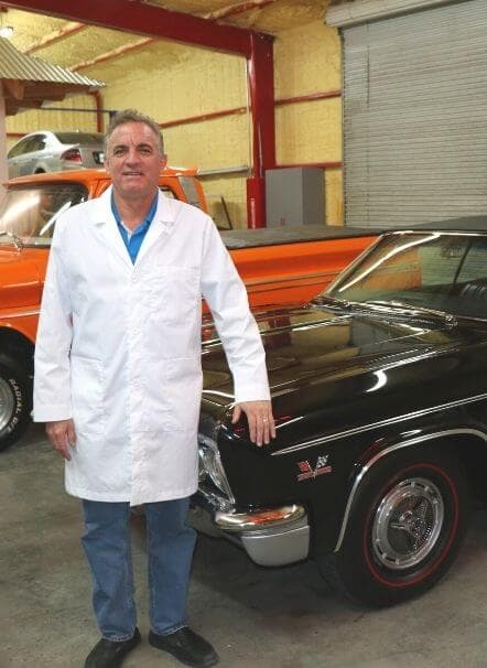 Rick Vaal, founder of The Lab Zone, with vintage cars